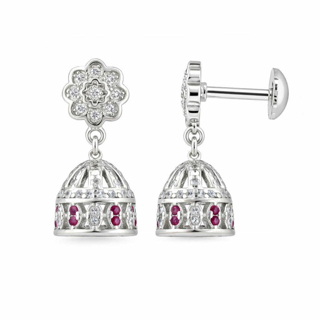 Silver earrings with floral and cage designs on a white background