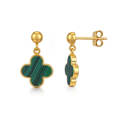 Gold earrings with green clover-shaped stones on a white background