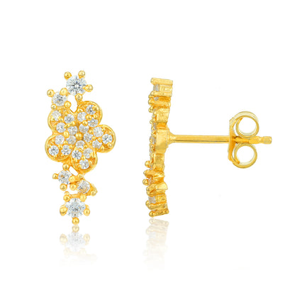 Gold earrings with diamond accents on a white background