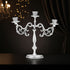 Silver candelabra on a dark background