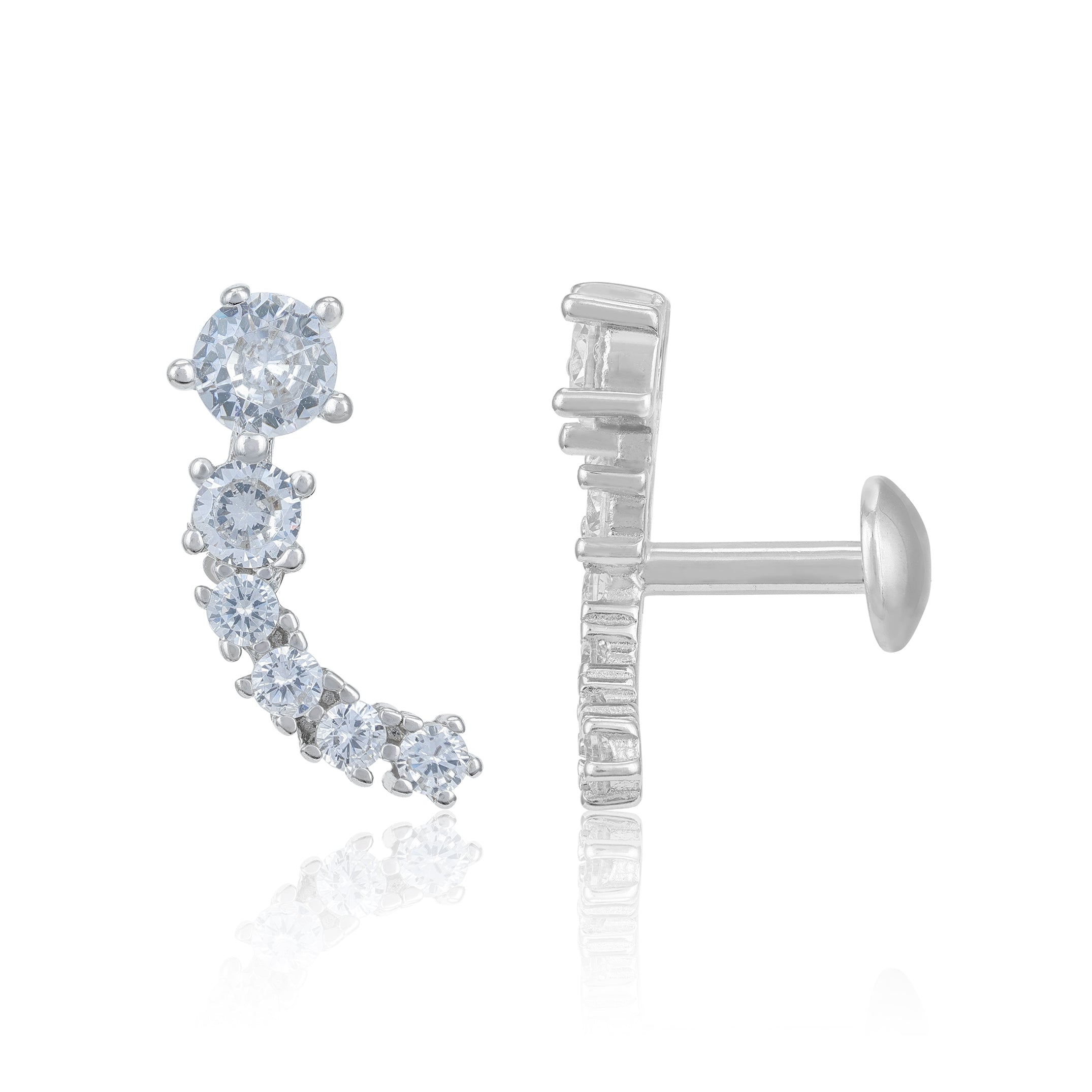 Silver earring with clear gemstones on a white background