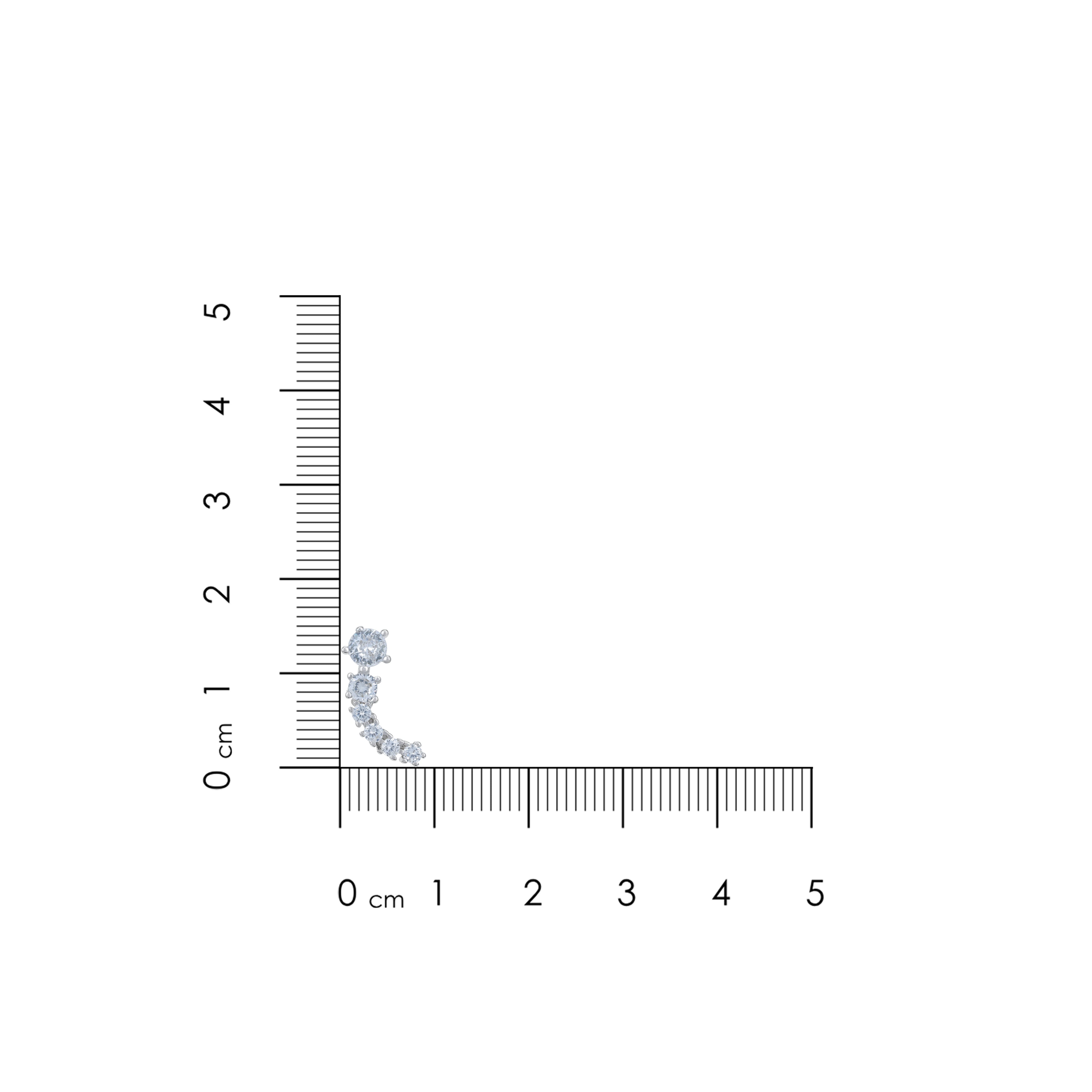 Two small blue earrings on a ruler for scale
