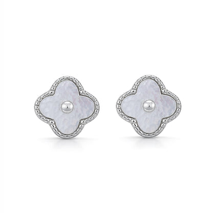Pair of floral earrings with pearl centers on a white background