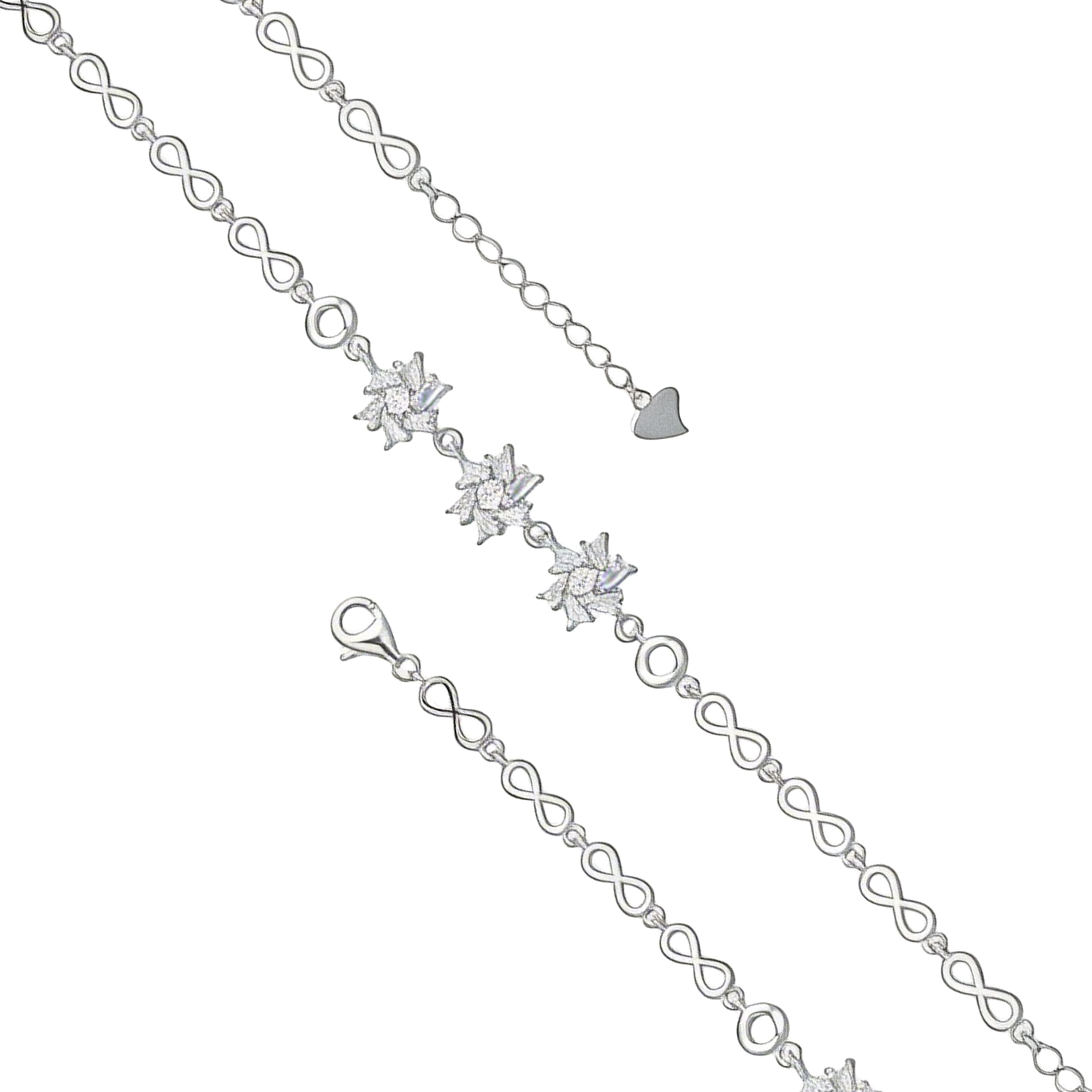 Silver bracelet with heart and infinity symbols on a pink fabric background