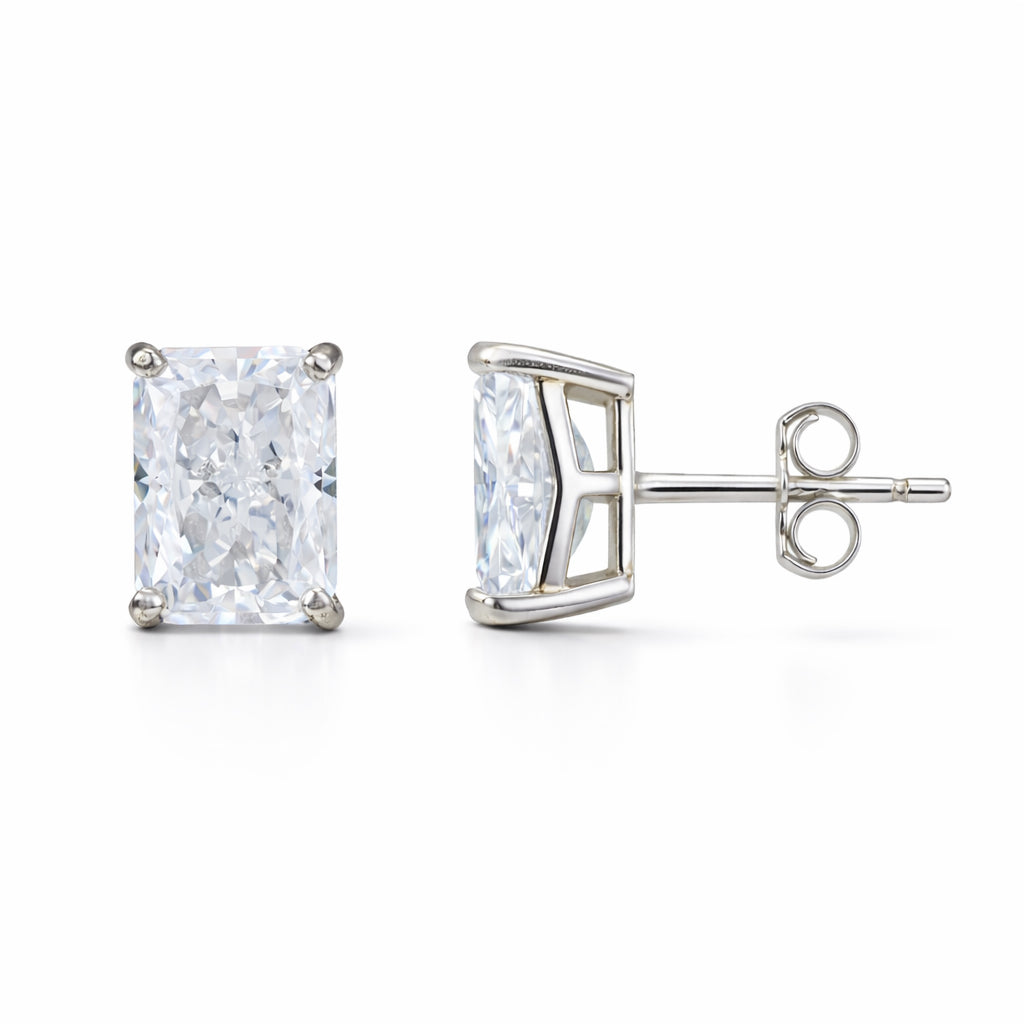 Pair of diamond stud earrings on a white background