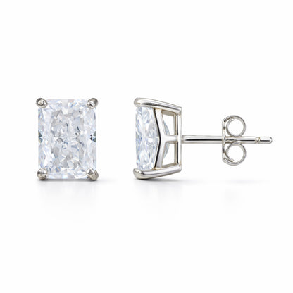Pair of diamond stud earrings on a white background
