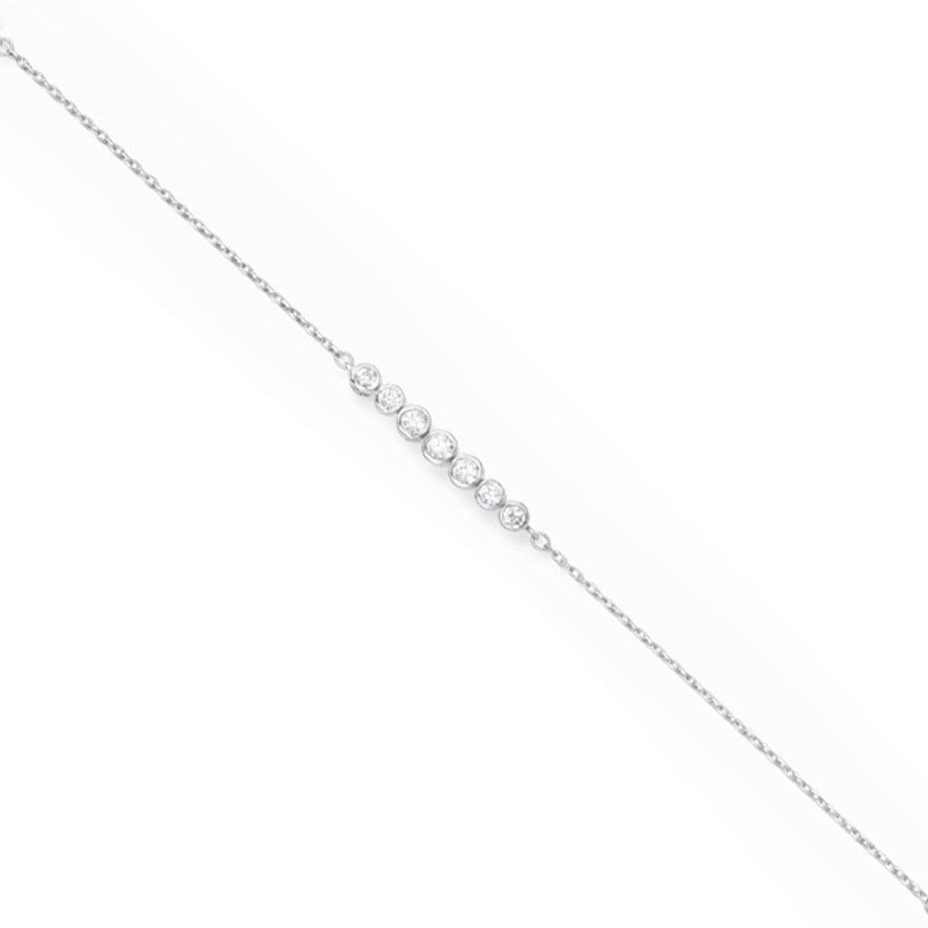 Silver chain necklace with small round beads on a white background