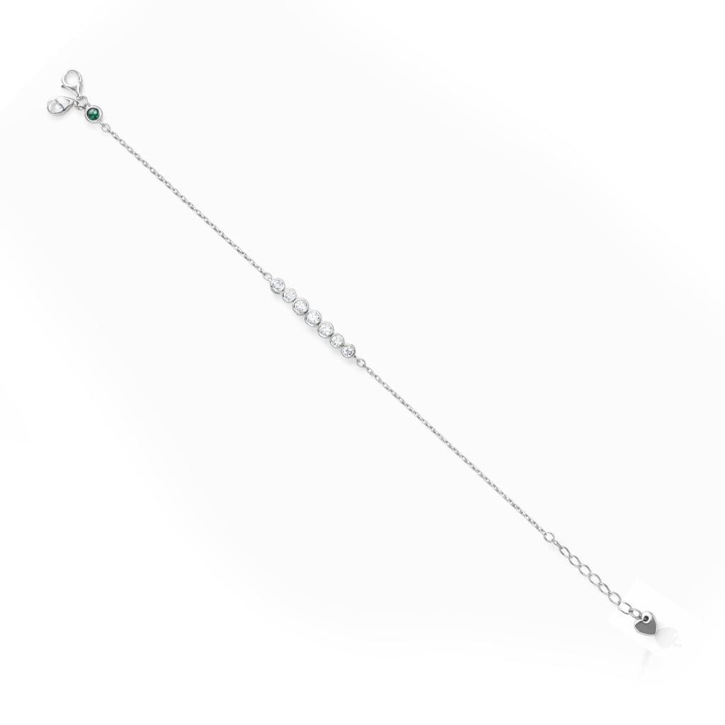 Delicate silver necklace with small beads on a white background