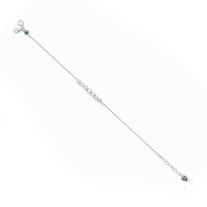 Delicate silver necklace with small beads on a white background