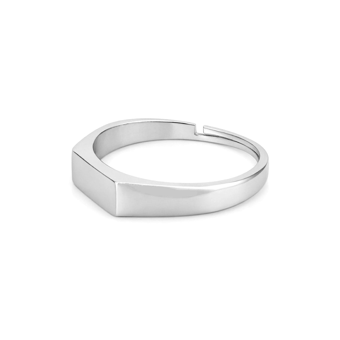 Silver ring with a geometric design on a white background