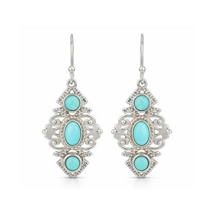 Pair of earrings with turquoise stones on a white background