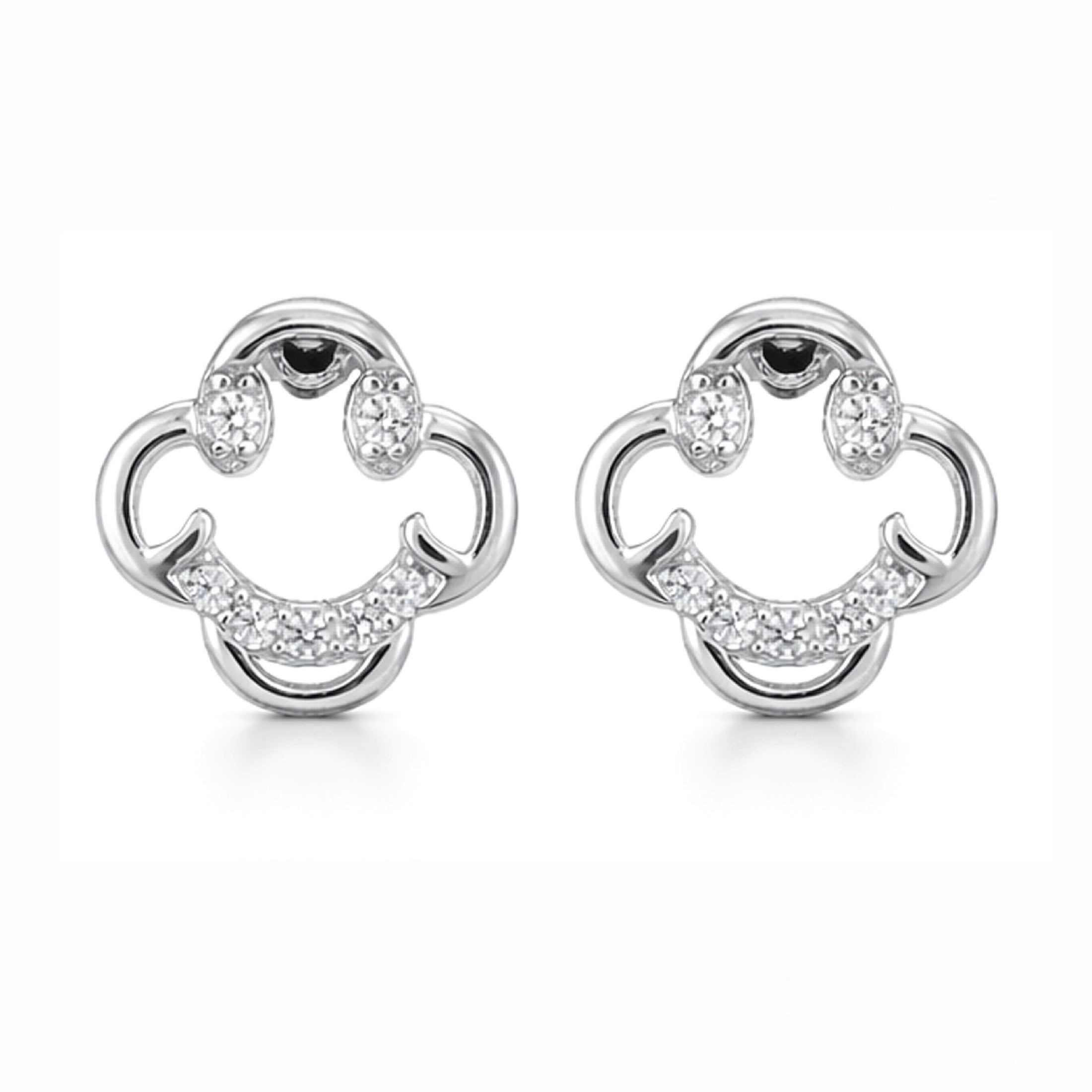 Pair of silver earrings with black gemstones on a white background