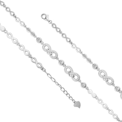 Silver chain necklace with infinity and heart designs on a white background