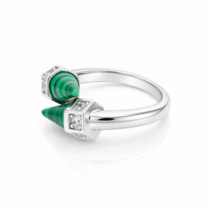 Silver ring with green gemstones and diamonds on a white background