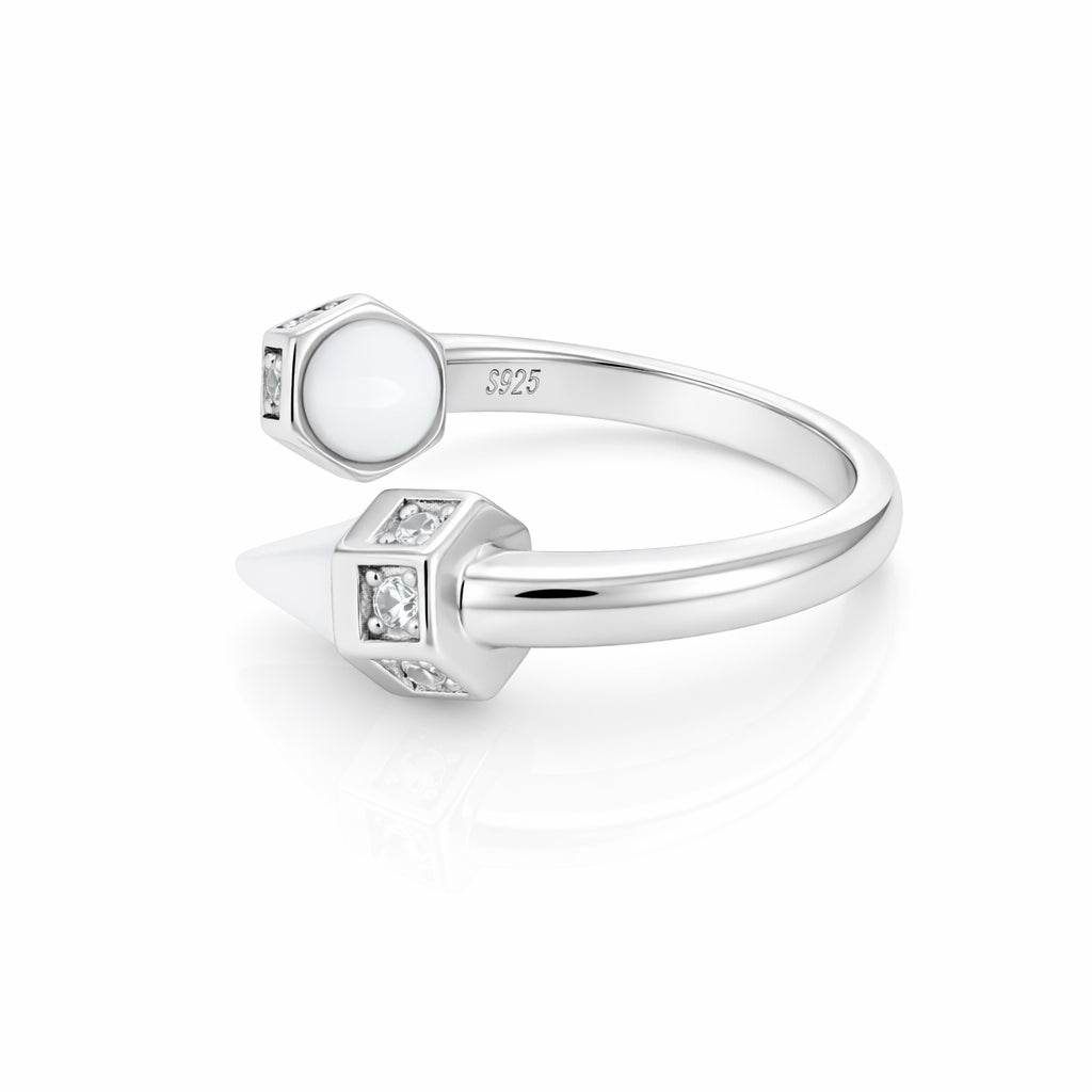 Silver ring with gemstones on a white background