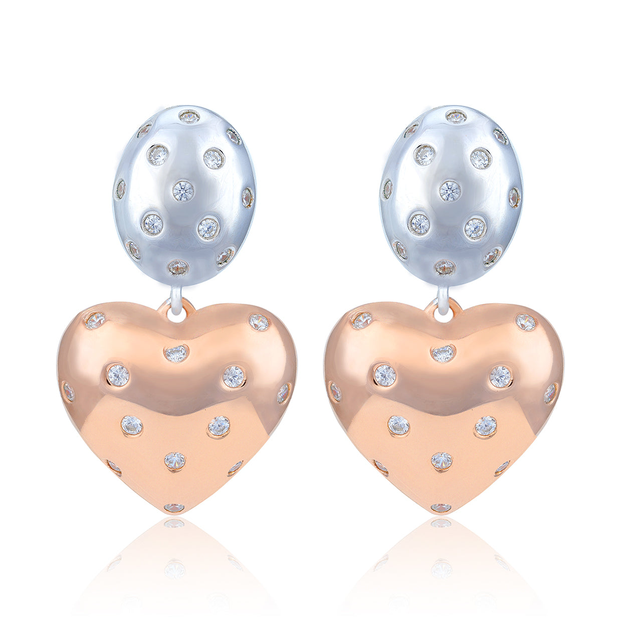 Heart-shaped earrings with rose gold and silver finishes on a white background