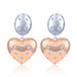 Heart-shaped earrings with rose gold and silver finishes on a white background