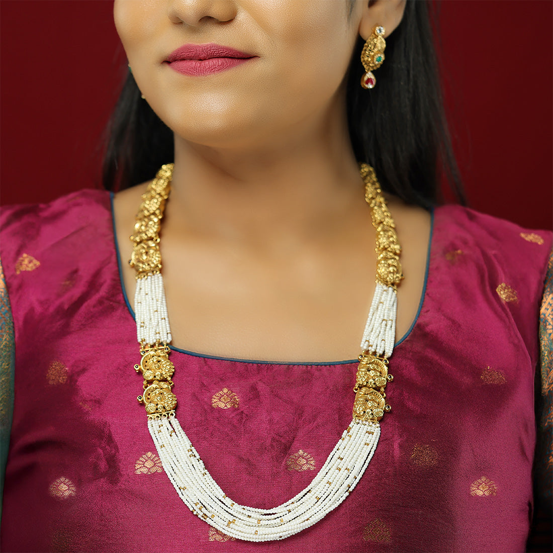 Elegance of White Pearls Enhanced Rich Golden Detailing 925 Mala