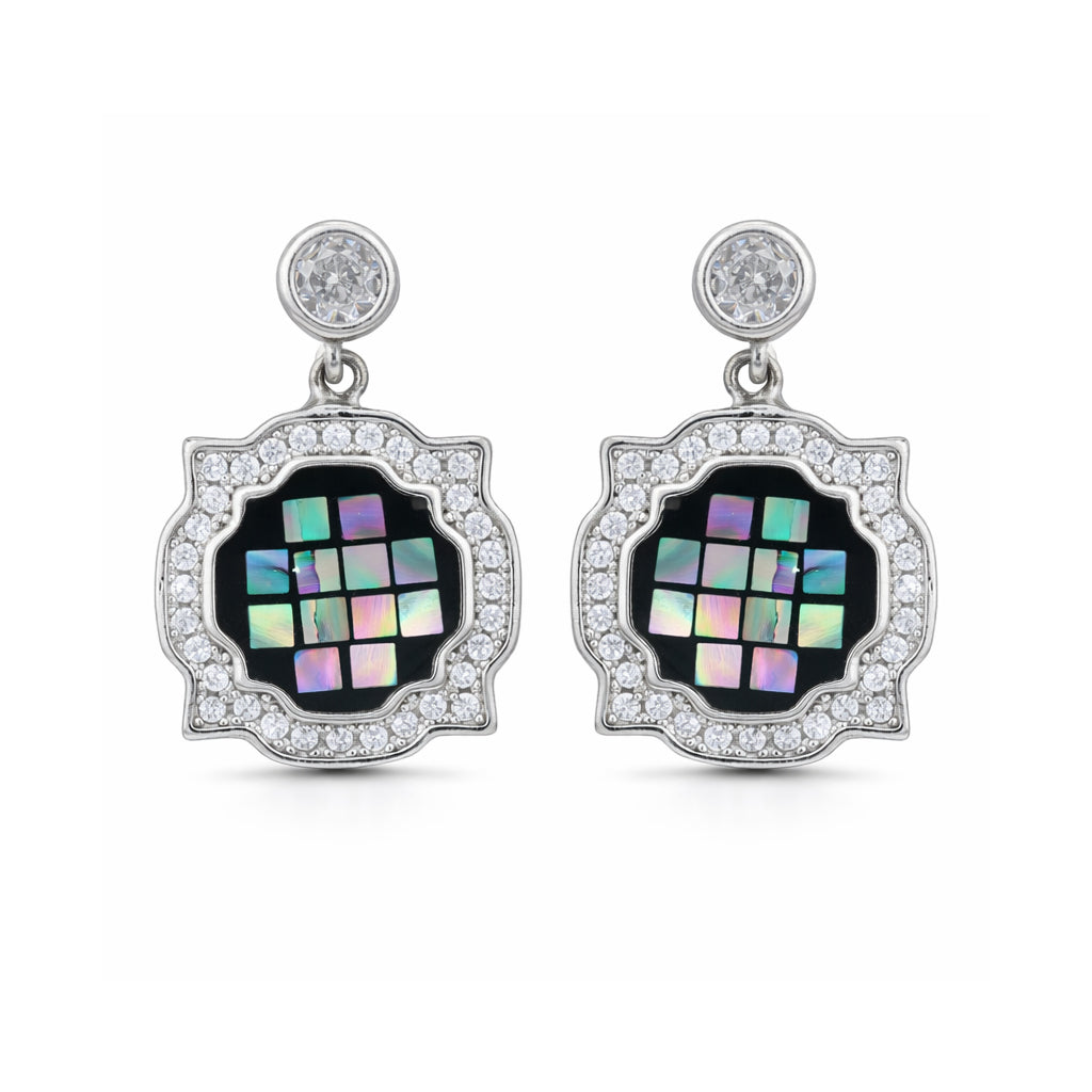 Pair of earrings with black gemstones and diamond-like stones on a white background