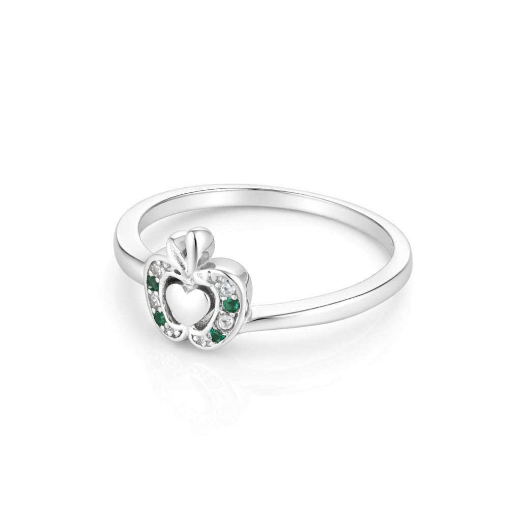 Silver ring with a heart design and green gemstones on a white background
