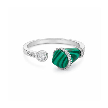 Silver ring with a green stone on a white background