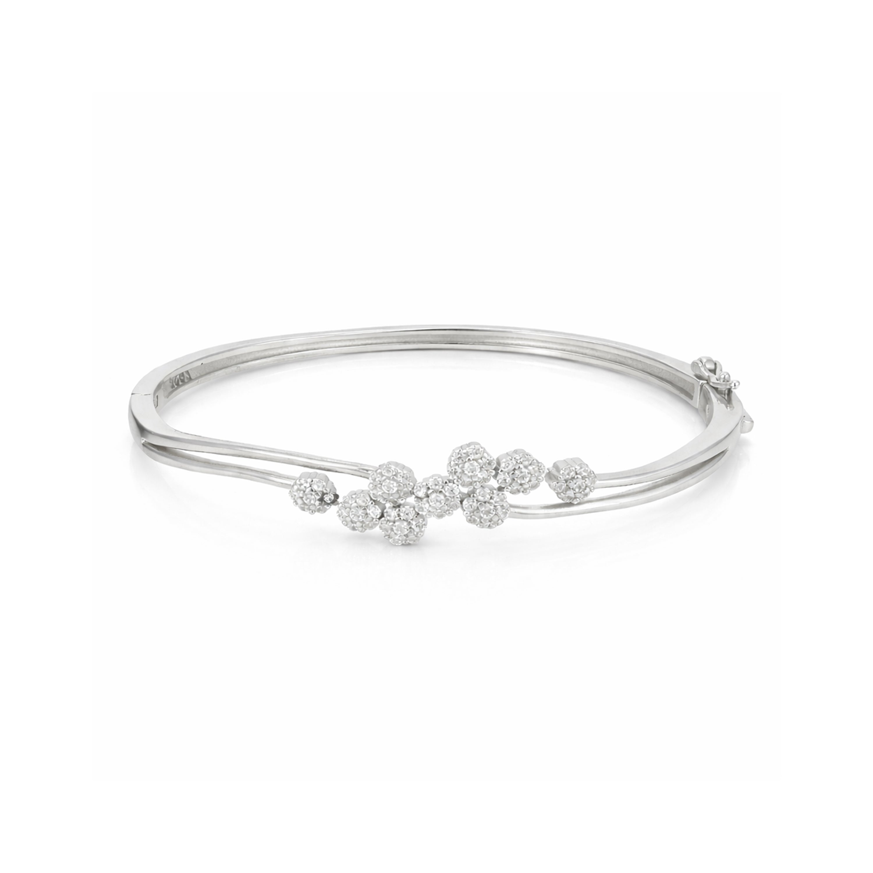 Silver bracelet with floral design on a white background