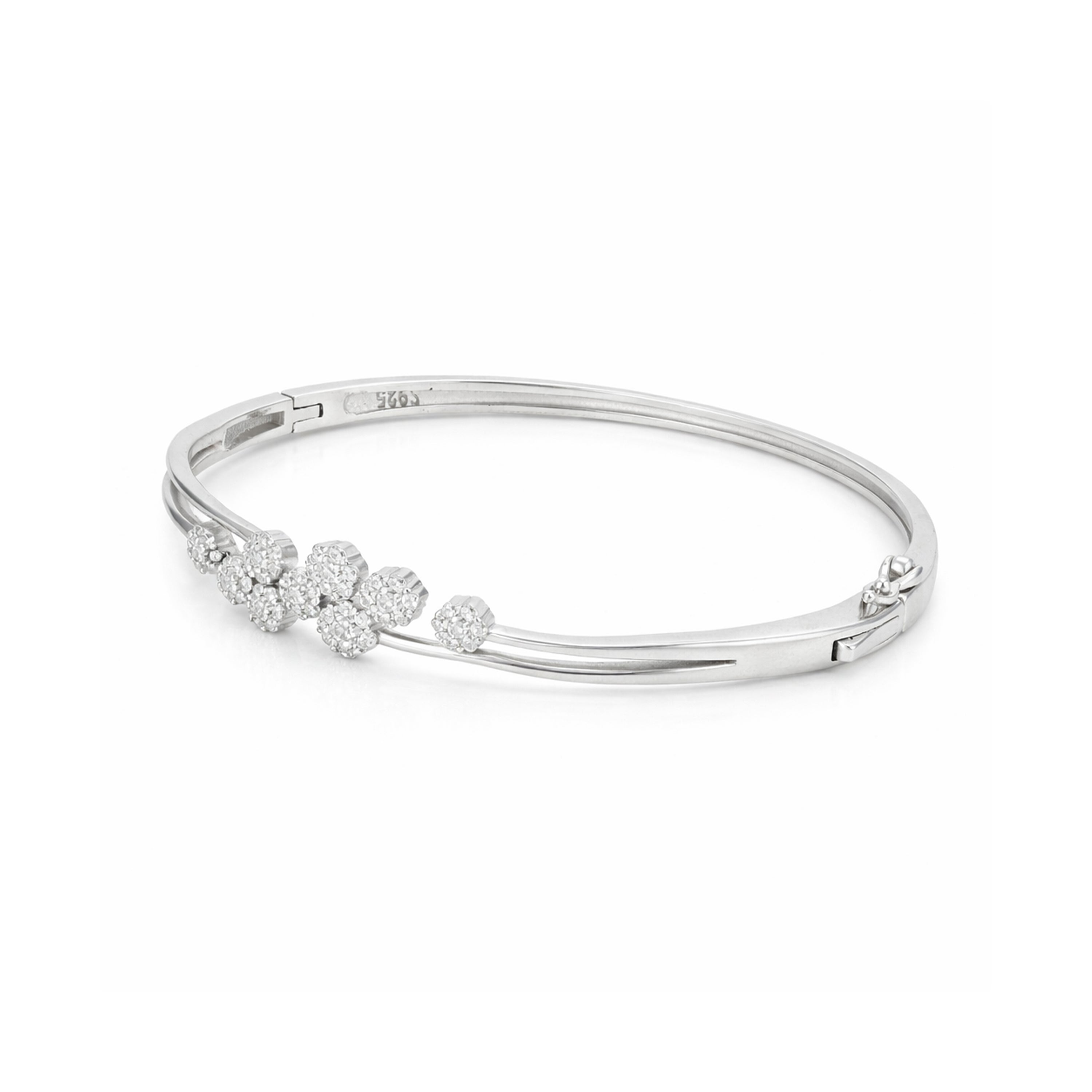 Silver bracelet with floral design on a white background