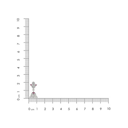 Diamond ring with a blue gemstone on a ruler for scale