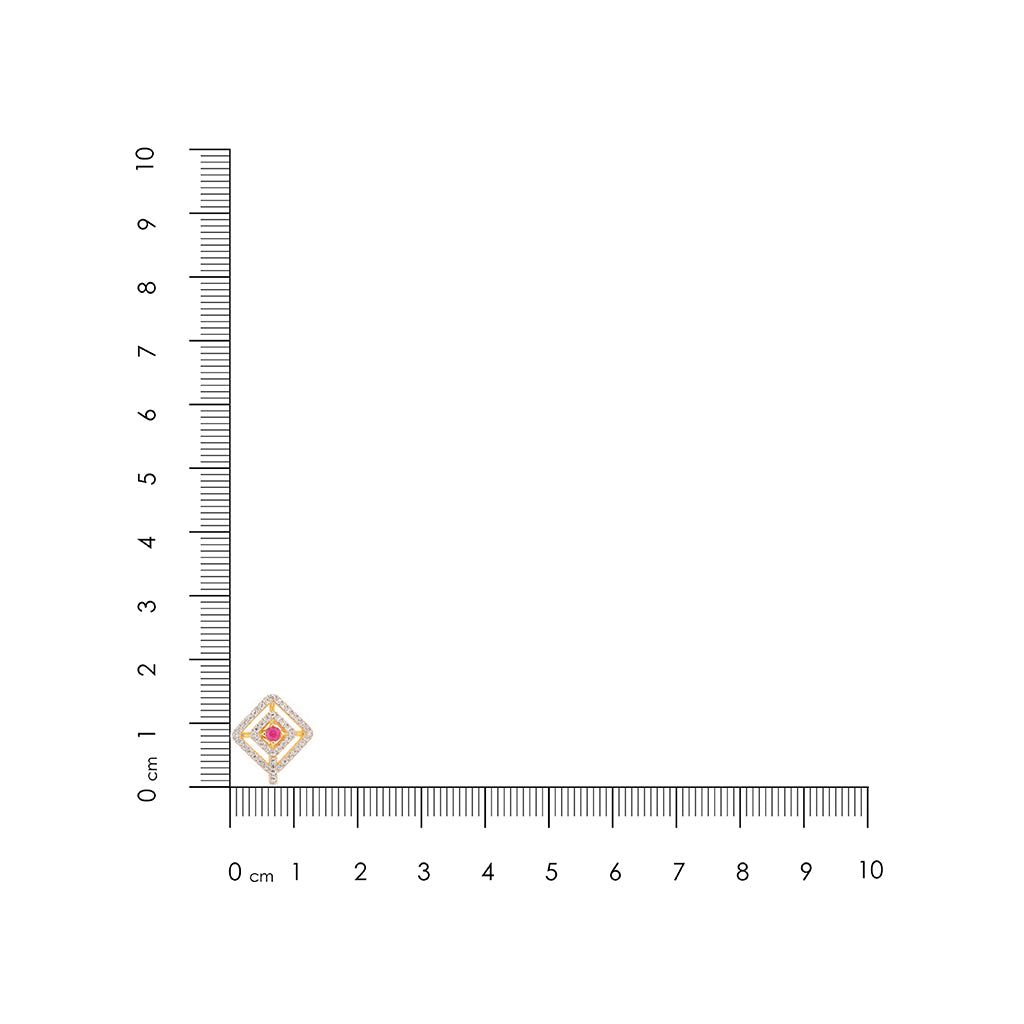 Gold ring with a red gemstone next to a ruler on a white background