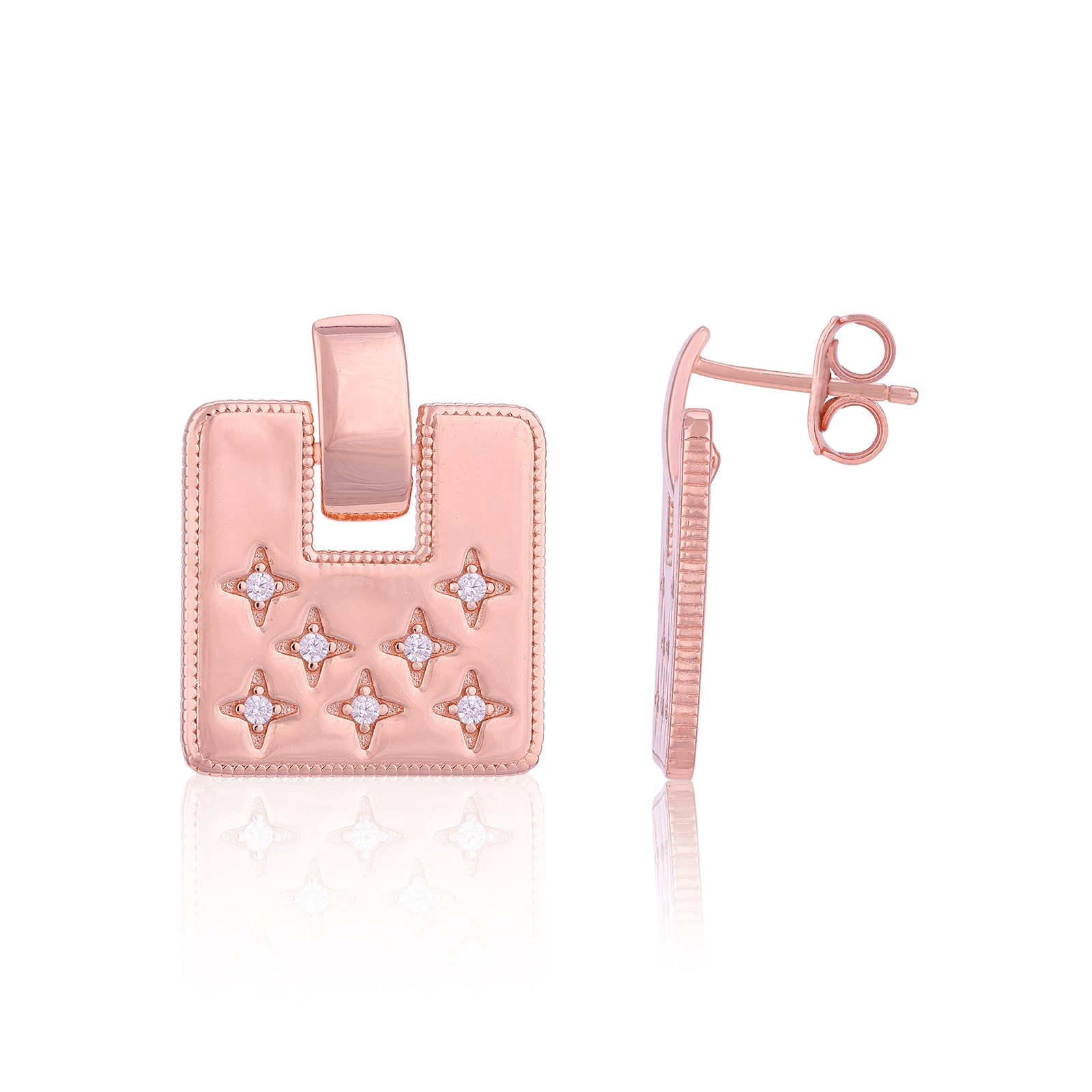Rose gold earring with star designs on a white background