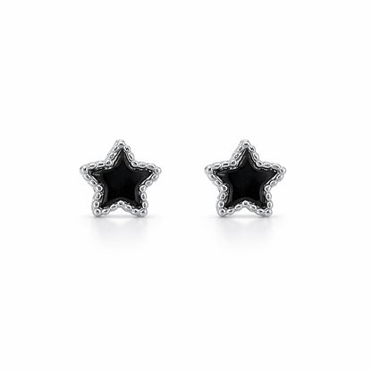 Star-shaped earrings with black centers and silver rims on a white background