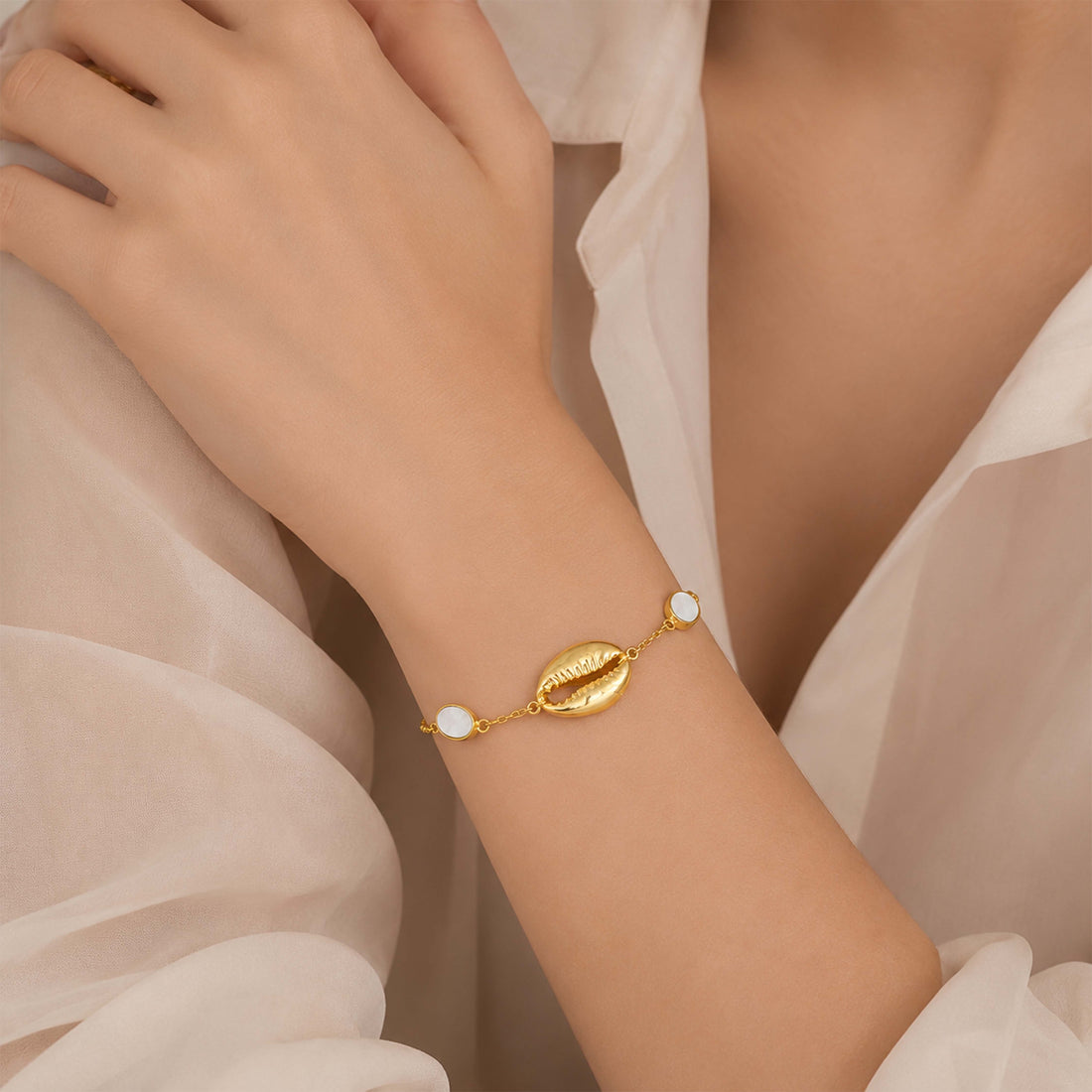 Golden Cowrie Shell Pearl Accent Designer Chain Bracelet