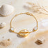 Golden Cowrie Shell Pearl Accent Designer Chain Bracelet