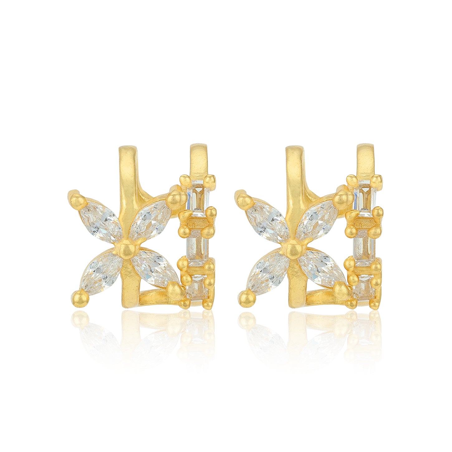 Gold earrings with diamond-like stones on a white background