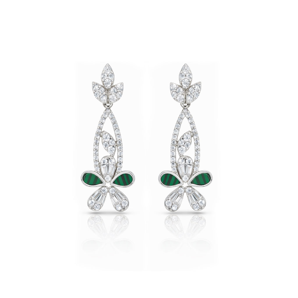 Pair of silver earrings with green accents on a white background