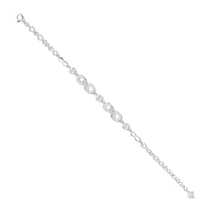 Silver bracelet with intricate links on a white background