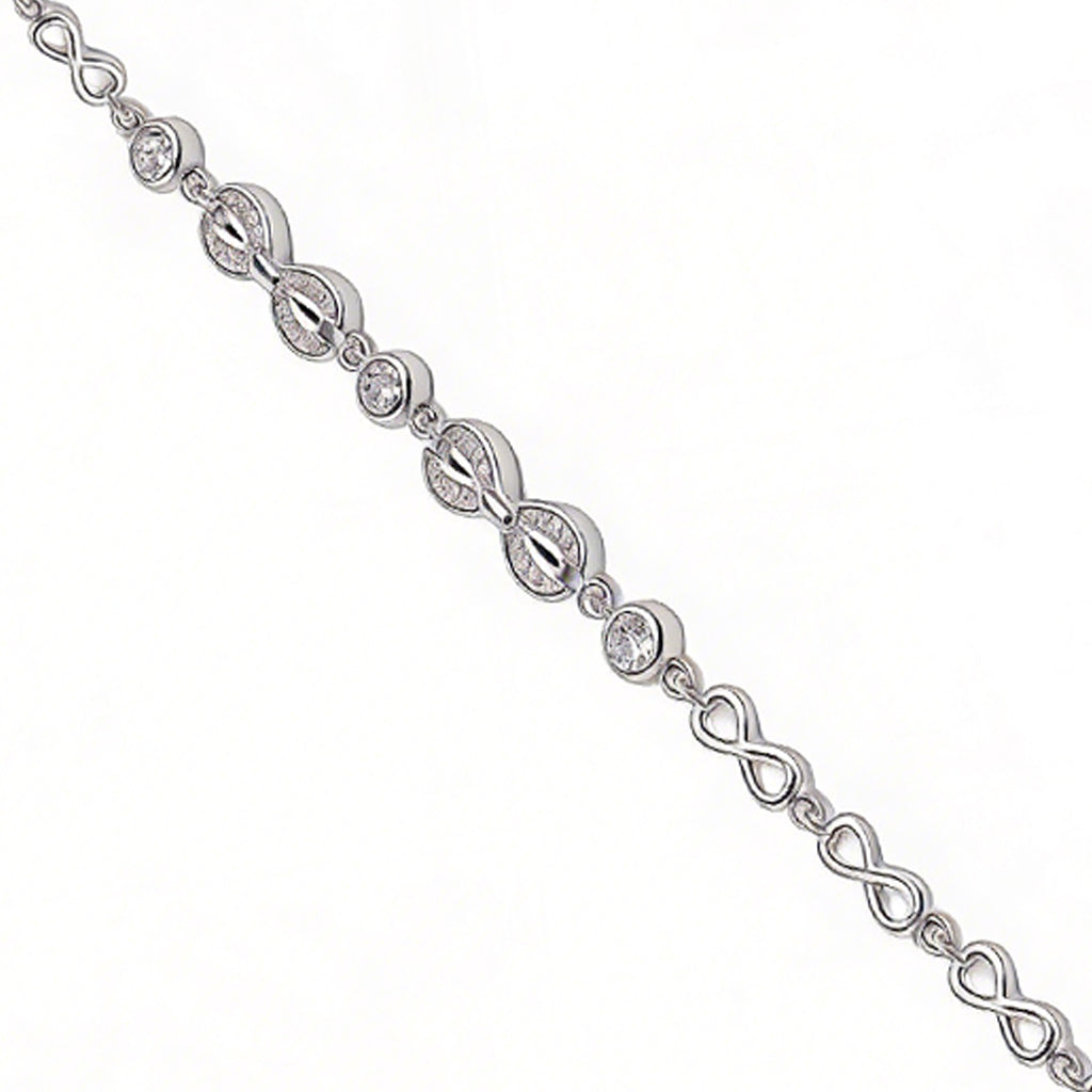 Silver bracelet with interlocking design on a white background