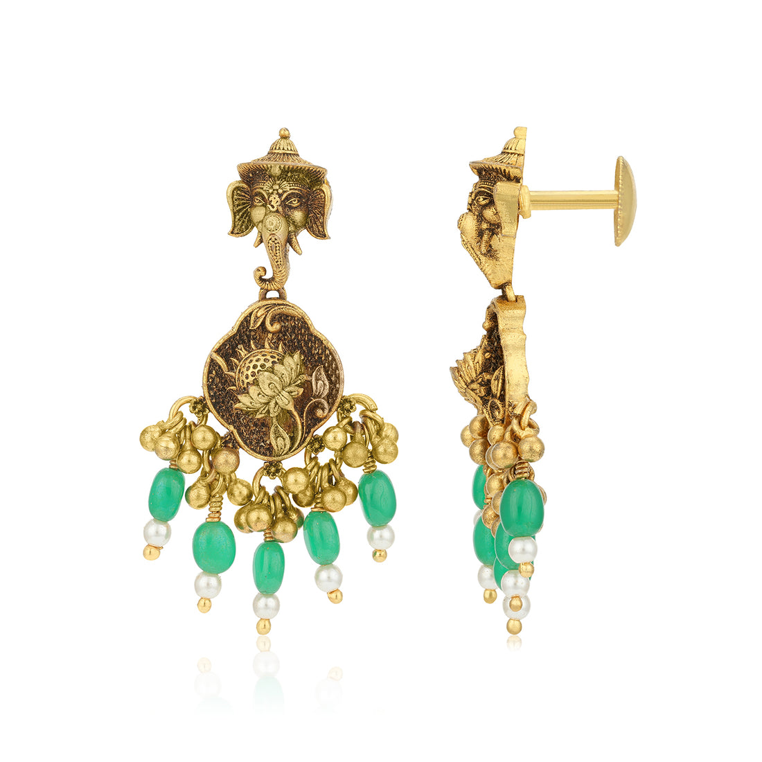 Gold and green earrings with intricate designs on a white background