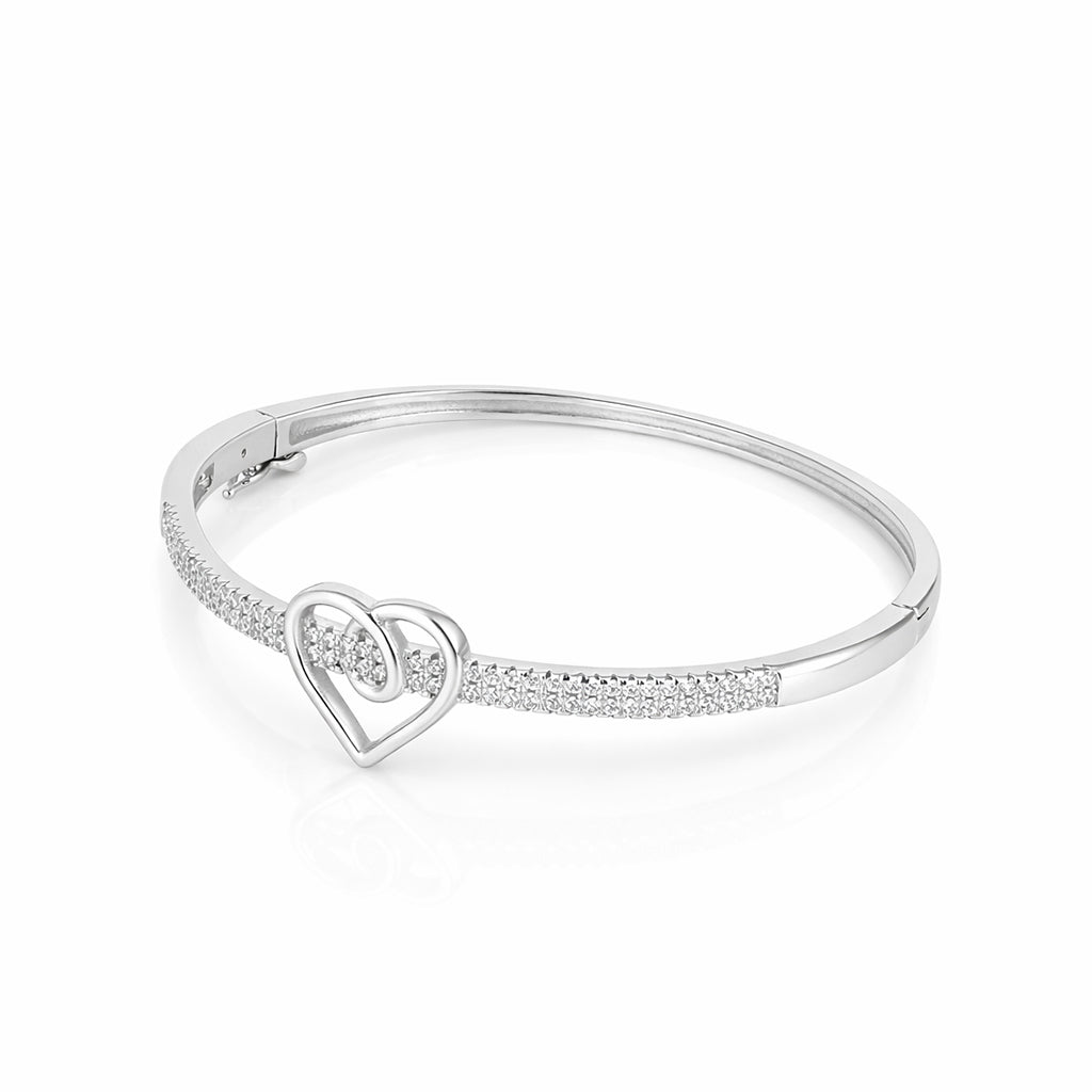 Silver bracelet with a heart design on a white background