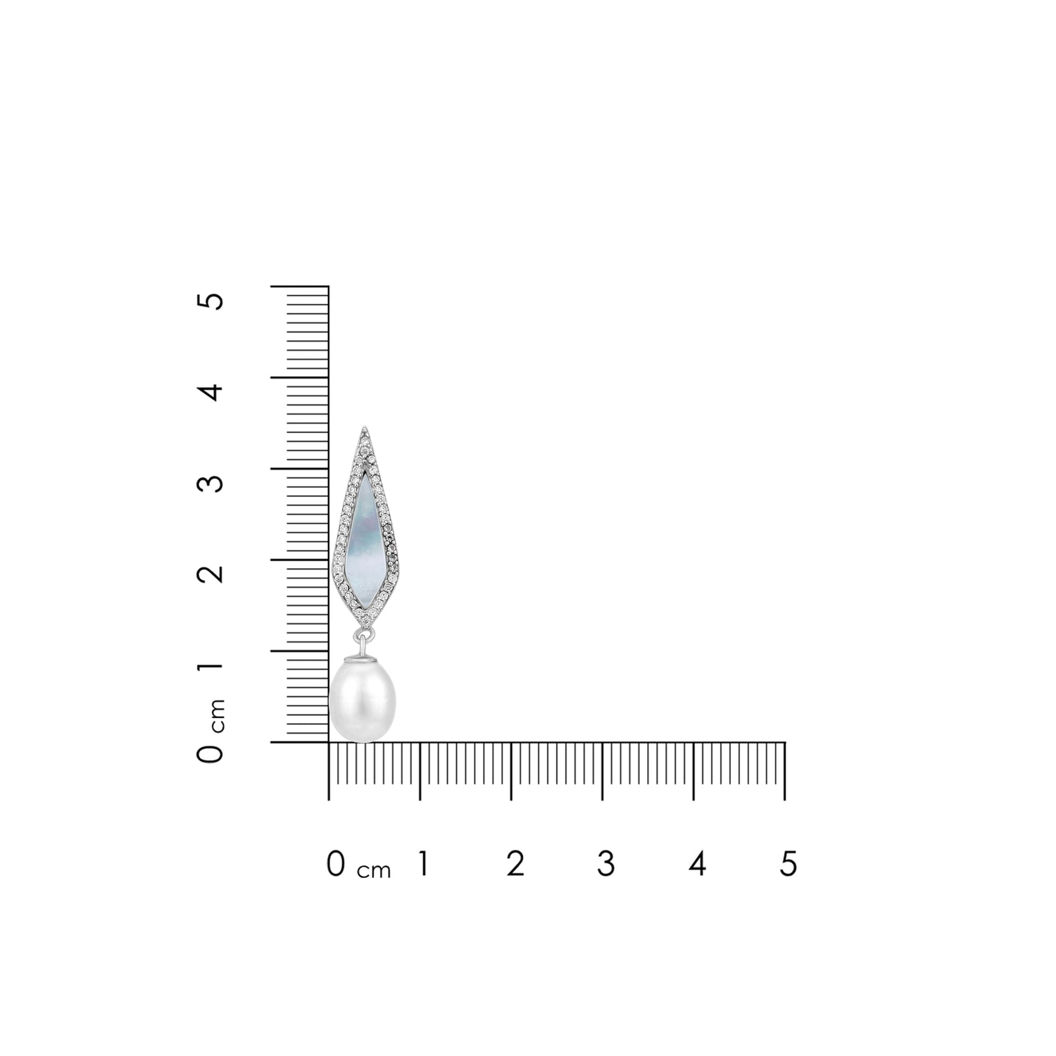 Jewelry earring with pearl and gemstones next to a ruler for scale on a white background