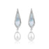 Pair of earrings with teardrop-shaped gemstones and pearl drops on a white background
