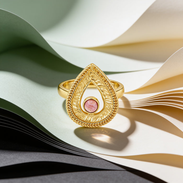 Luminous Teardrop Crest Pink Gem Golden Designer Ring