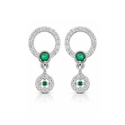 Pair of earrings with emerald stones and diamond accents on a white background