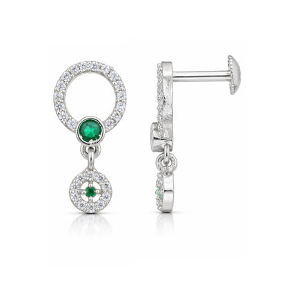 Silver earrings with emerald stones on a white background