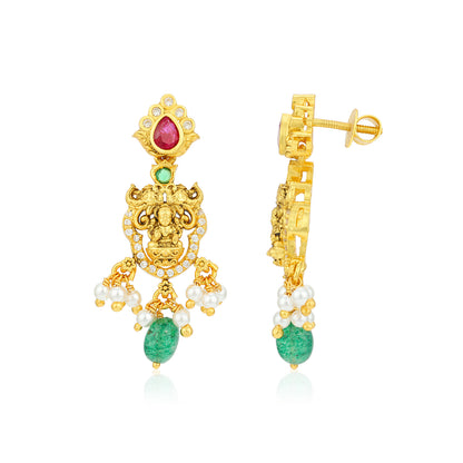 Gold earrings with gemstones and pearls on a white background