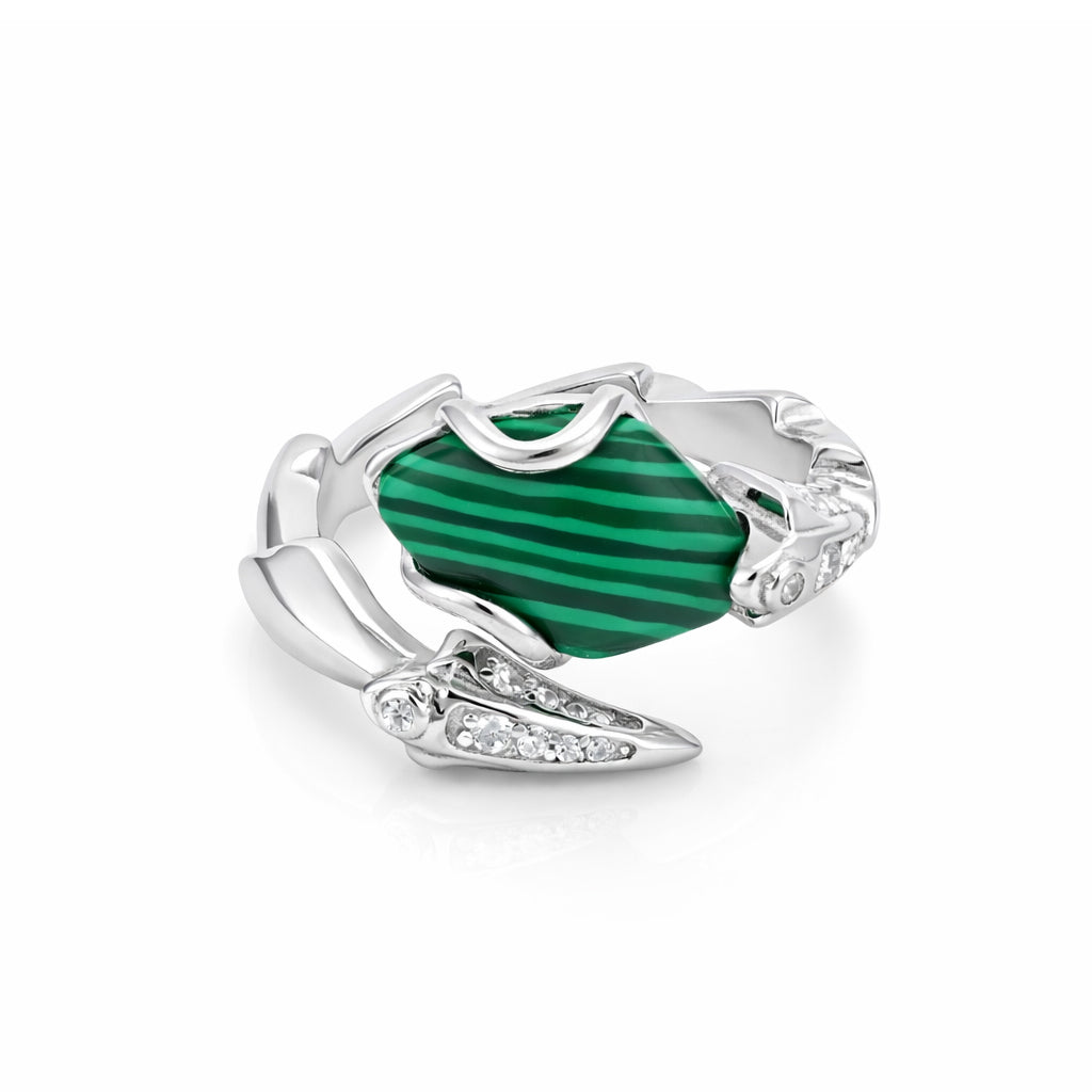 Silver ring with a green stone on a white background