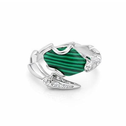 Silver ring with a green stone on a white background