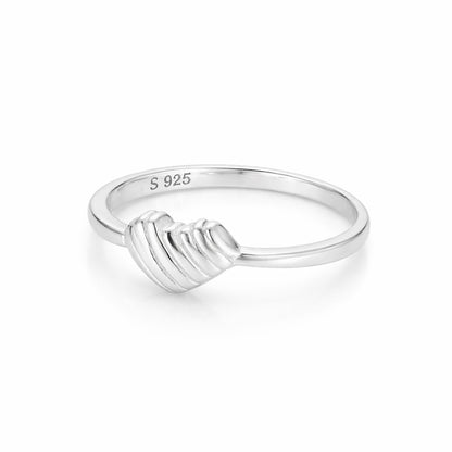 Silver ring with a unique design on a white background
