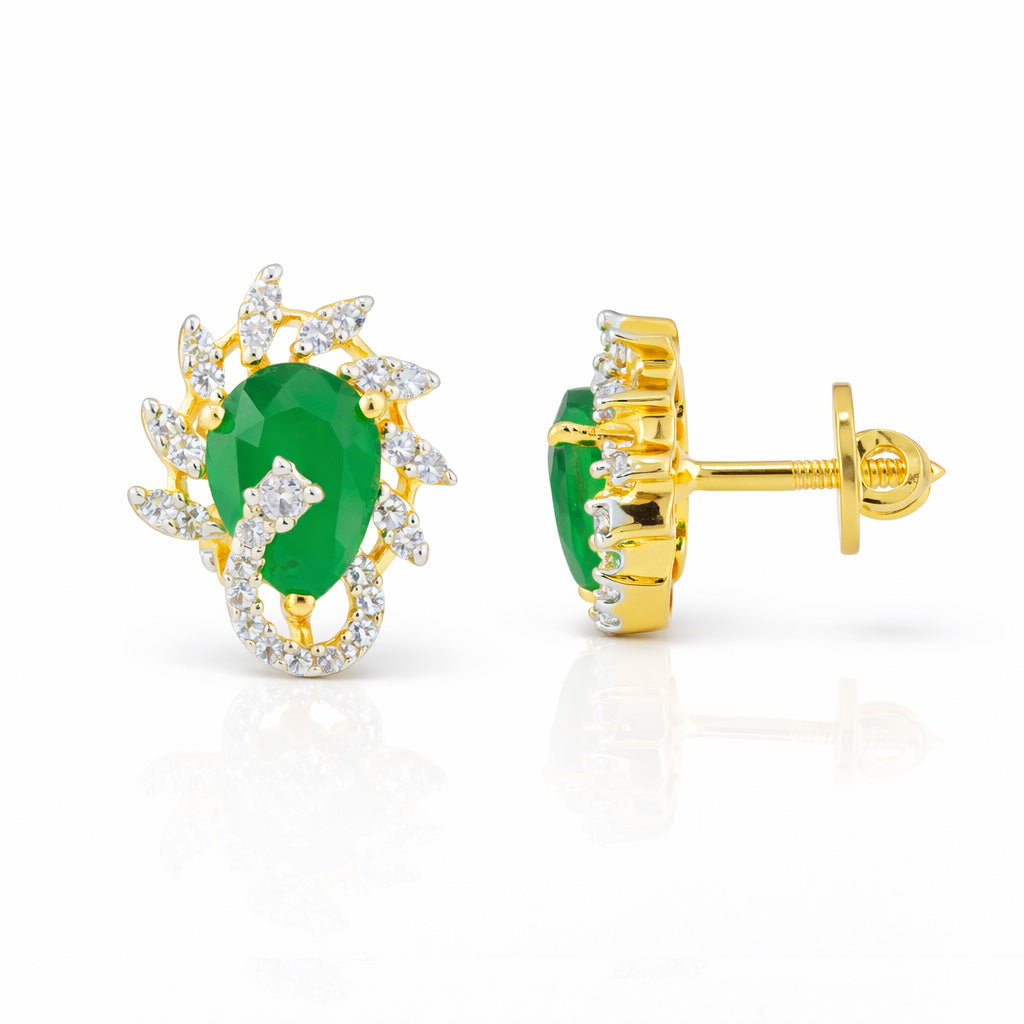 Gold earrings with green gemstones on a white background