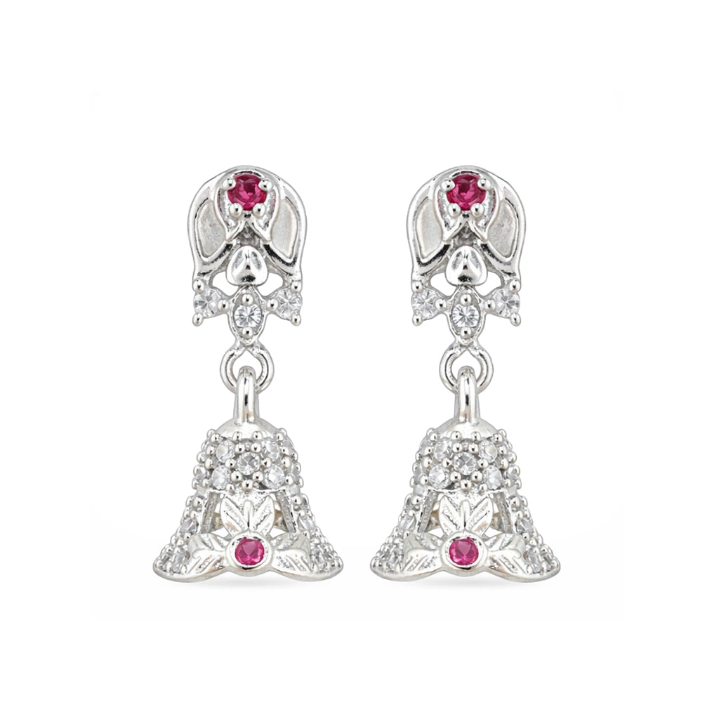 Pair of silver earrings with red gemstones on a white background
